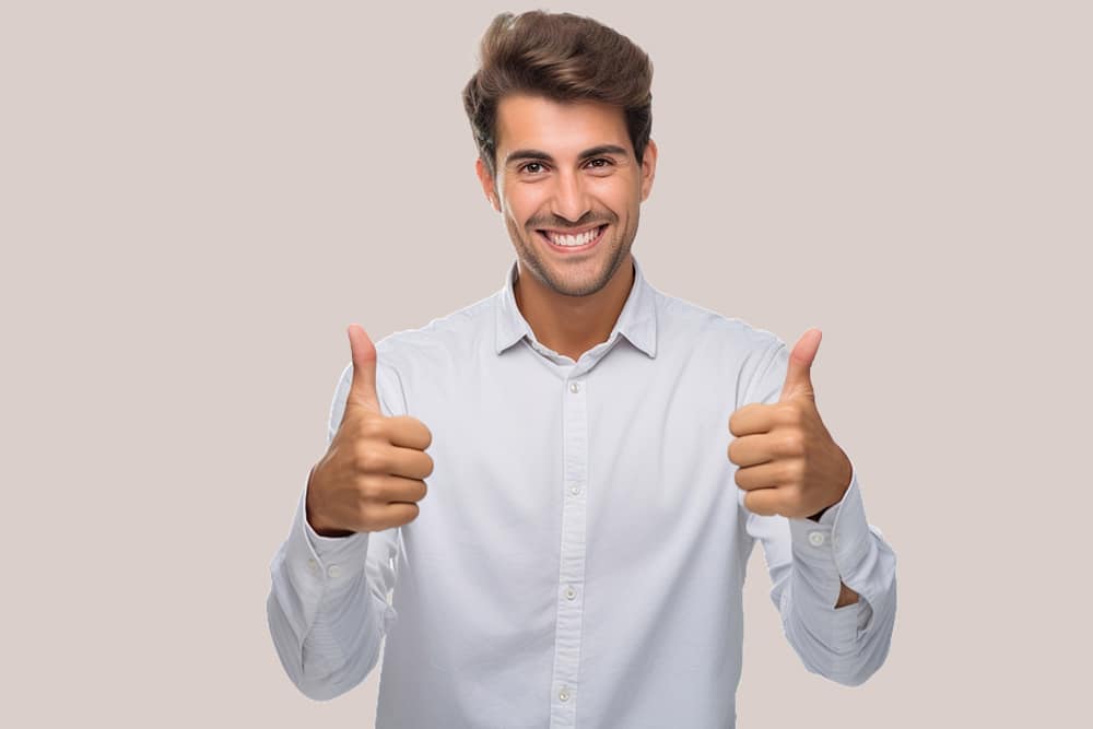 Male with both Thumbs Up in white shirt.